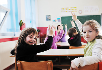 Image showing happy kids with  teacher in  school classroom