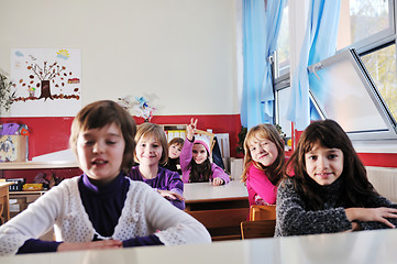 Image showing happy kids with  teacher in  school classroom