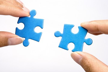 Image showing Holding Jigsaw Puzzle