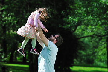 Image showing happy man and girl outdoor