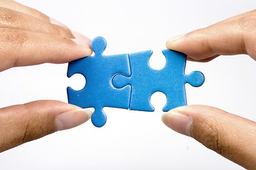 Image showing Holding Jigsaw Puzzle