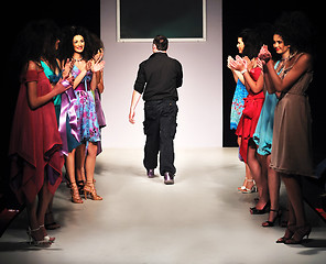 Image showing young fashion designer on the stage