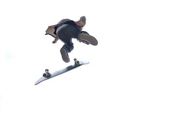 Image showing Boy practicing skate in a skate park - isolated