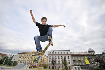 Image showing Boy practicing skate in a skate park 