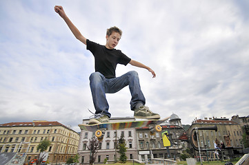 Image showing Boy practicing skate in a skate park 