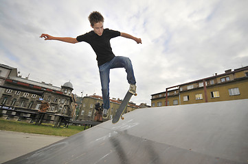 Image showing Boy practicing skate in a skate park 