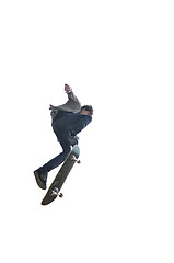 Image showing Boy practicing skate in a skate park - isolated