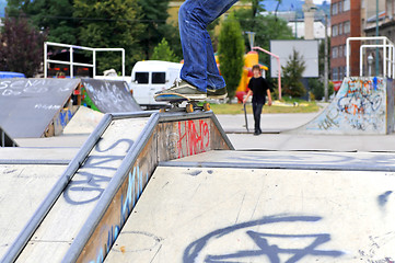 Image showing Boy practicing skate in a skate park