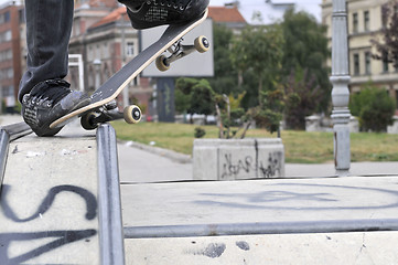 Image showing Boy practicing skate in a skate park