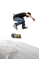 Image showing Boy practicing skate in a skate park - isolated