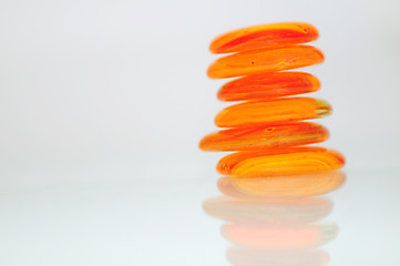 Image showing isolated wet zen stones with splashing  water drops  