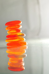 Image showing isolated wet zen stones with splashing  water drops  