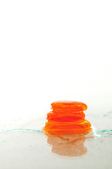 Image showing isolated wet zen stones with splashing  water drops  