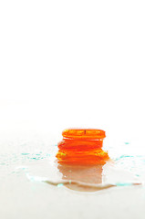 Image showing isolated wet zen stones with splashing  water drops  