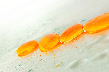 Image showing isolated wet zen stones with splashing  water drops  