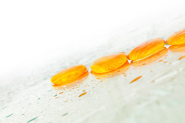 Image showing isolated wet zen stones with splashing  water drops  