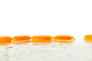 Image showing isolated wet zen stones with splashing  water drops  