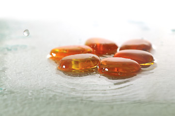 Image showing isolated wet zen stones with splashing  water drops