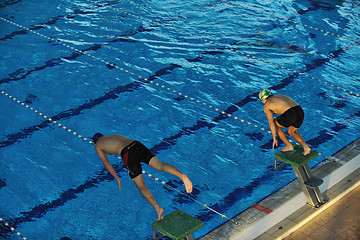 Image showing young swimmmer on swimming start