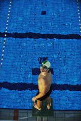 Image showing young swimmmer on swimming start