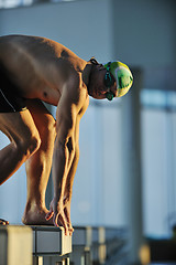 Image showing young swimmmer on swimming start