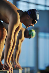 Image showing young swimmmer on swimming start