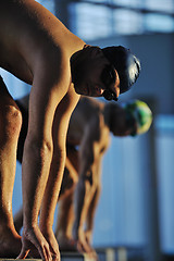 Image showing young swimmmer on swimming start