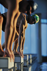 Image showing young swimmmer on swimming start