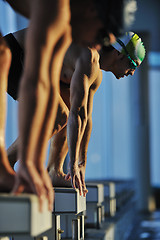 Image showing young swimmmer on swimming start