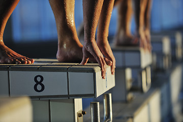 Image showing young swimmmer on swimming start