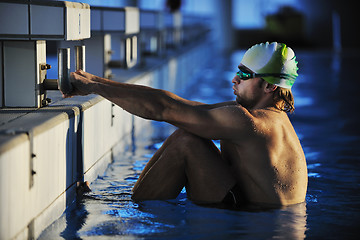 Image showing young swimmmer on swimming start