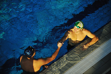 Image showing swimming race winner