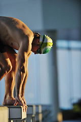 Image showing young swimmmer on swimming start