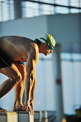 Image showing young swimmmer on swimming start