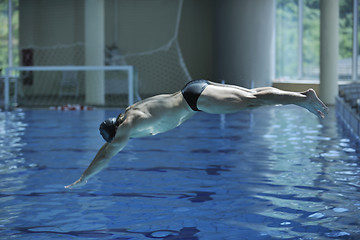 Image showing young swimmer ready for start