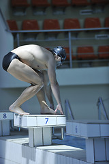 Image showing young swimmer ready for start