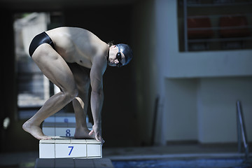 Image showing young swimmer ready for start