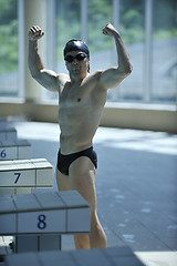 Image showing young swimmer ready for start