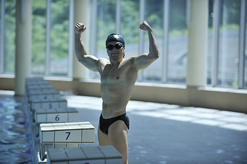 Image showing young swimmer ready for start