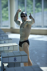 Image showing young swimmer ready for start