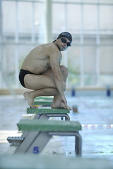 Image showing young swimmer ready for start