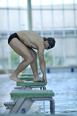 Image showing young swimmer ready for start