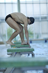 Image showing young swimmer ready for start