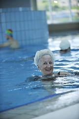 Image showing senior woman at swimming pool