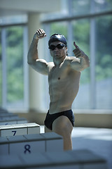 Image showing young swimmer ready for start