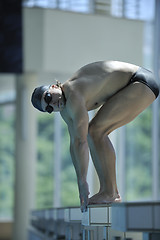 Image showing young swimmer ready for start