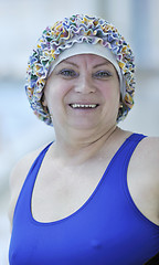 Image showing senior woman at swimming pool