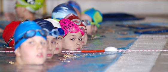 Image showing .childrens in serie at swimming pool 