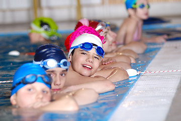 Image showing .childrens in serie at swimming pool 