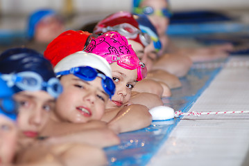 Image showing .childrens in serie at swimming pool 